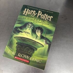 Harry Potter and the Half-Blood Prince by: J.K. Rowling, paperback book